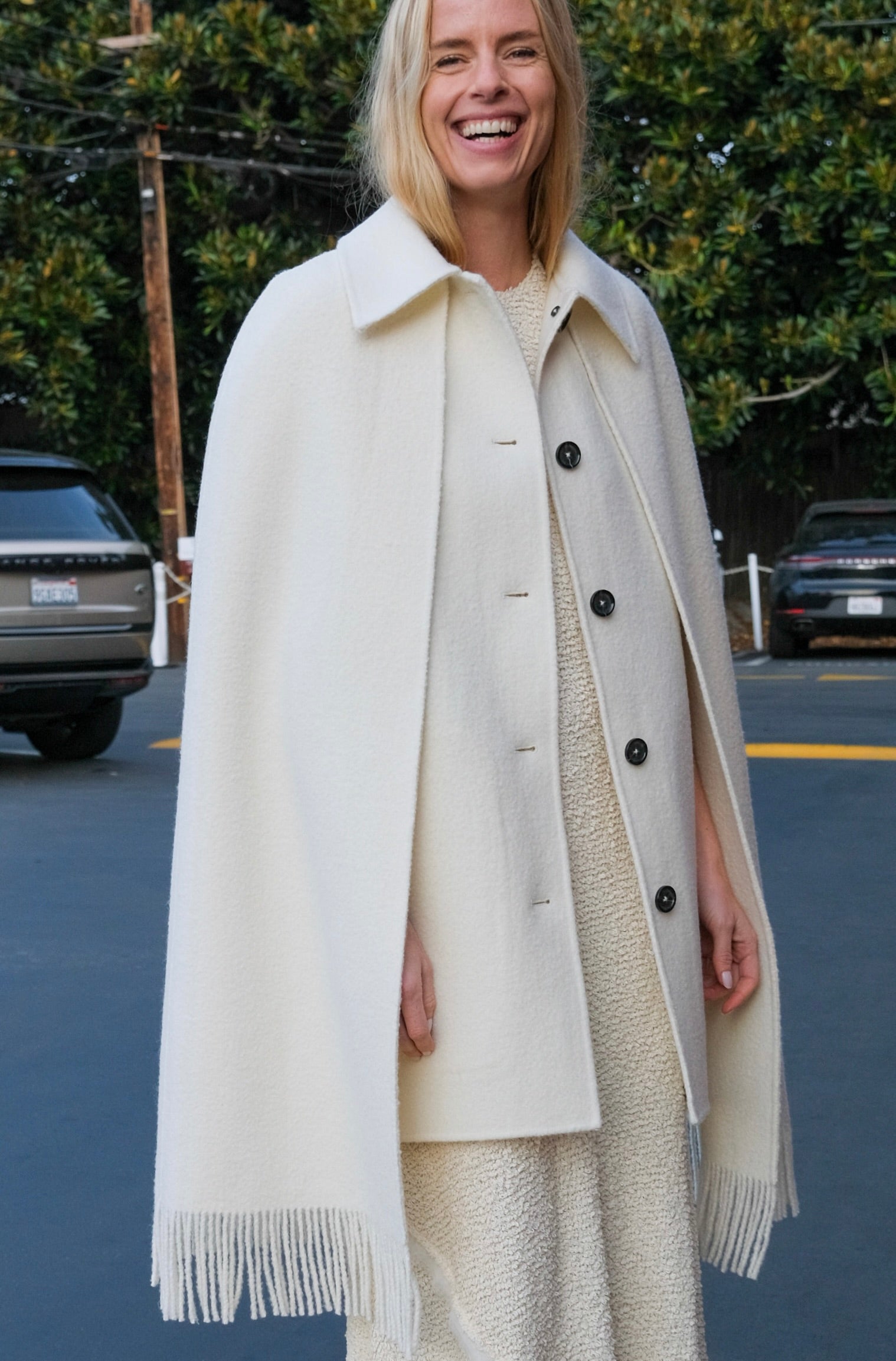 TOTEME | FRINGE CAPE COAT | WOMEN'S LUXURY DESIGNER CLOTHING, SHOES, HANDBAGS & JEWELRY | CAPITOL CHARLOTTE, NC & BRENTWOOD, CA