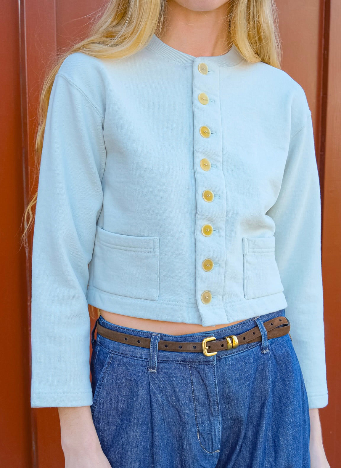 Pale mint colored cardigan jacket from Auralee. Button front and long sleeves with two front pockets. Available in Charlotte, NC and Brentwood, CA.