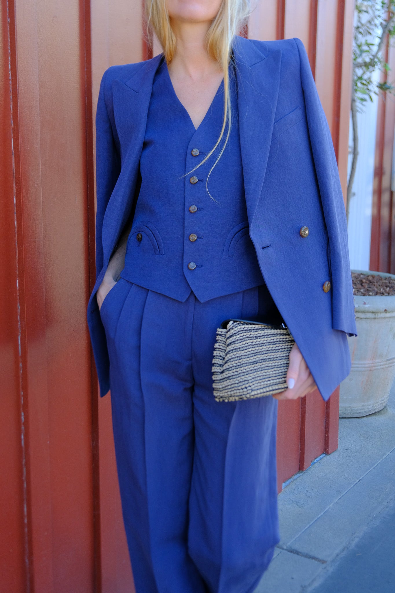 BLAZE | SAVANNAH NAVY FERAL GILET | Silk and linen blend gilet | Single breasted vest | Relaxed, minimalistic design | External smiley pockets | Tortoise effect button closure | Back martingale | Navy color way: 'Savannah Navy' | Composition: 59% Linen 41% Silk, Lining: 100% Viscose | Made in Italy | Available in Brentwood, CA