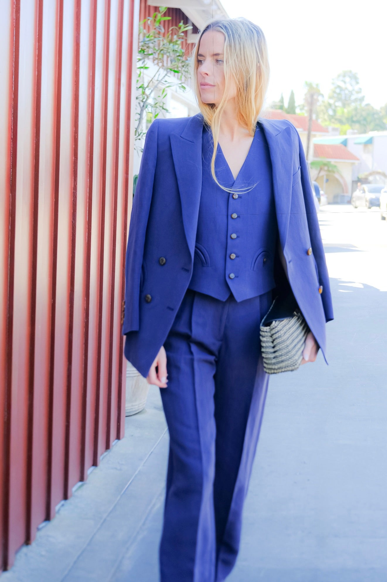 Navy high-rise straight-leg trousers from Blazé Milano in a linen-silk blend with refined tailoring. Available in Brentwood, CA and Charlotte, NC.