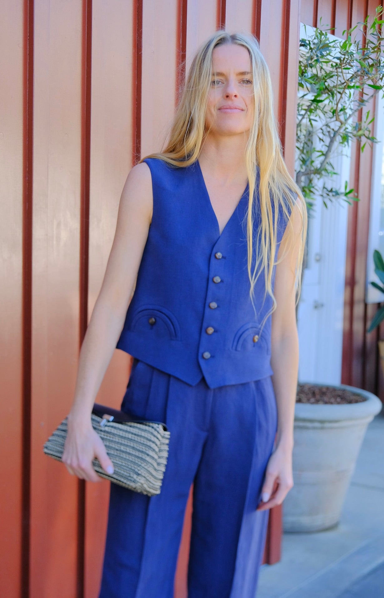 BLAZE | SAVANNAH NAVY FERAL GILET | Silk and linen blend gilet | Single breasted vest | Relaxed, minimalistic design | External smiley pockets | Tortoise effect button closure | Back martingale | Navy color way: 'Savannah Navy' | Composition: 59% Linen 41% Silk, Lining: 100% Viscose | Made in Italy | Available in Brentwood, CA