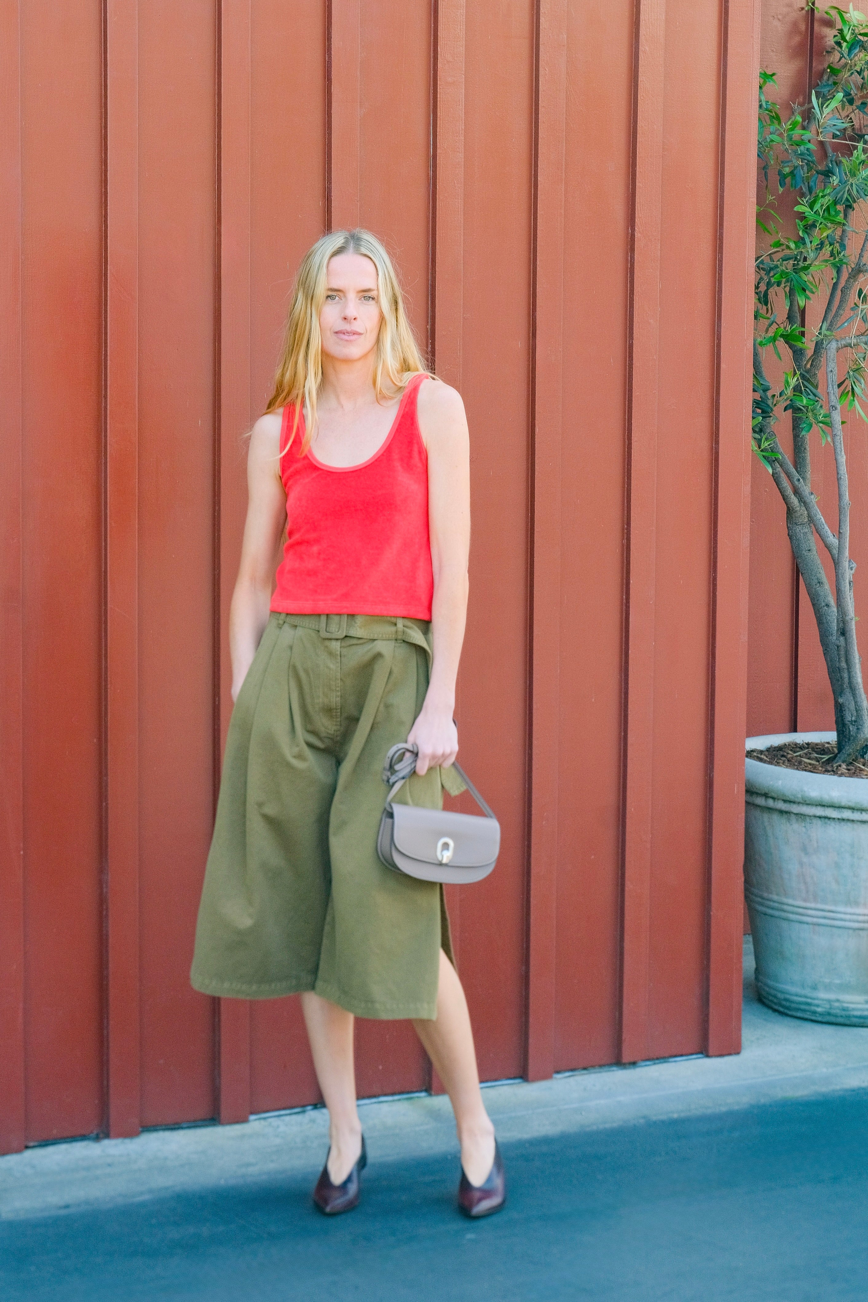 Avocado green garment-dyed pleated culottes from CO with a wide-leg cropped silhouette. Available in Brentwood, CA and Charlotte, NC.