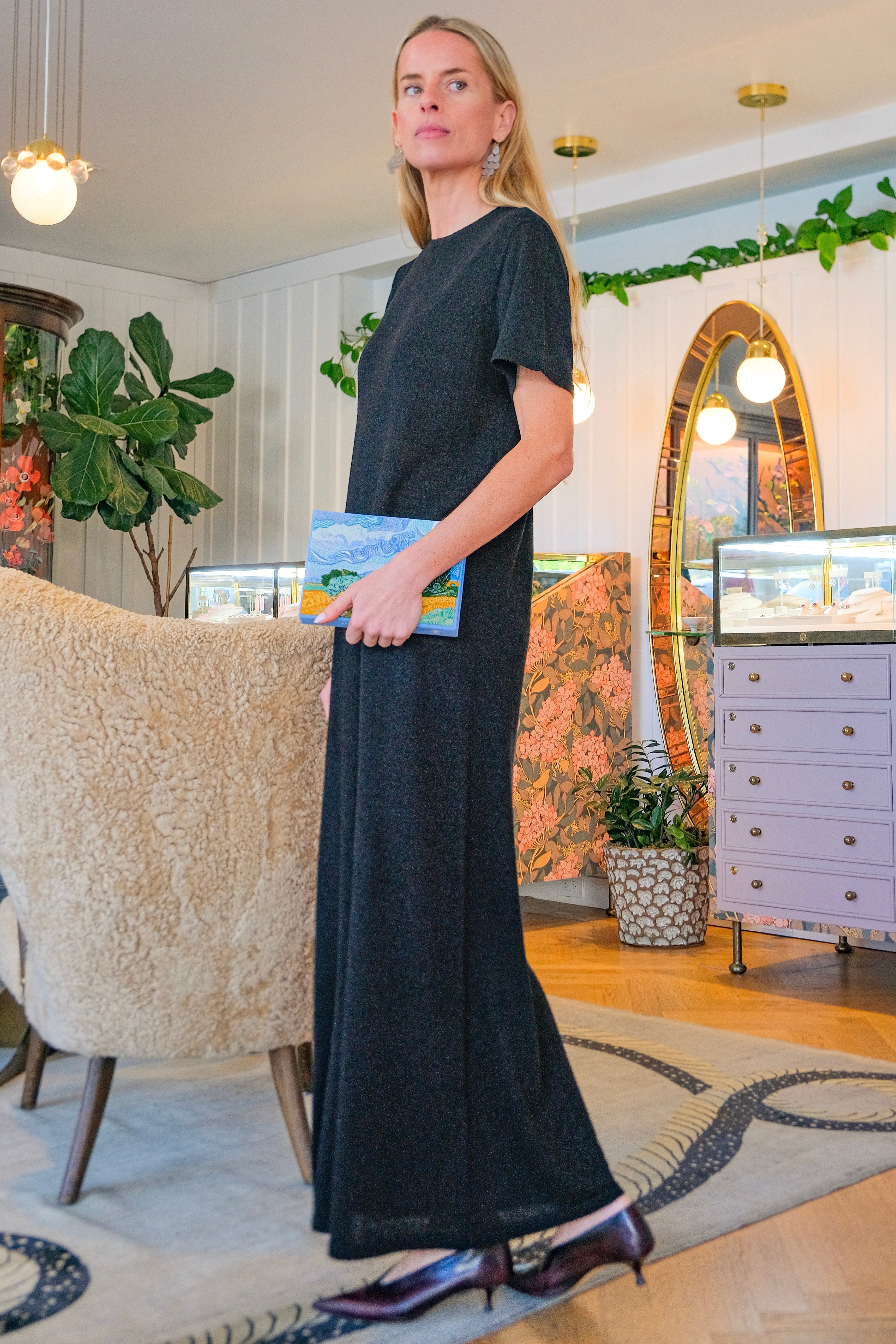 Black cotton jersey T-shirt dress from CO with a relaxed silhouette and classic crew neckline. Available in Brentwood, CA and Charlotte, NC.