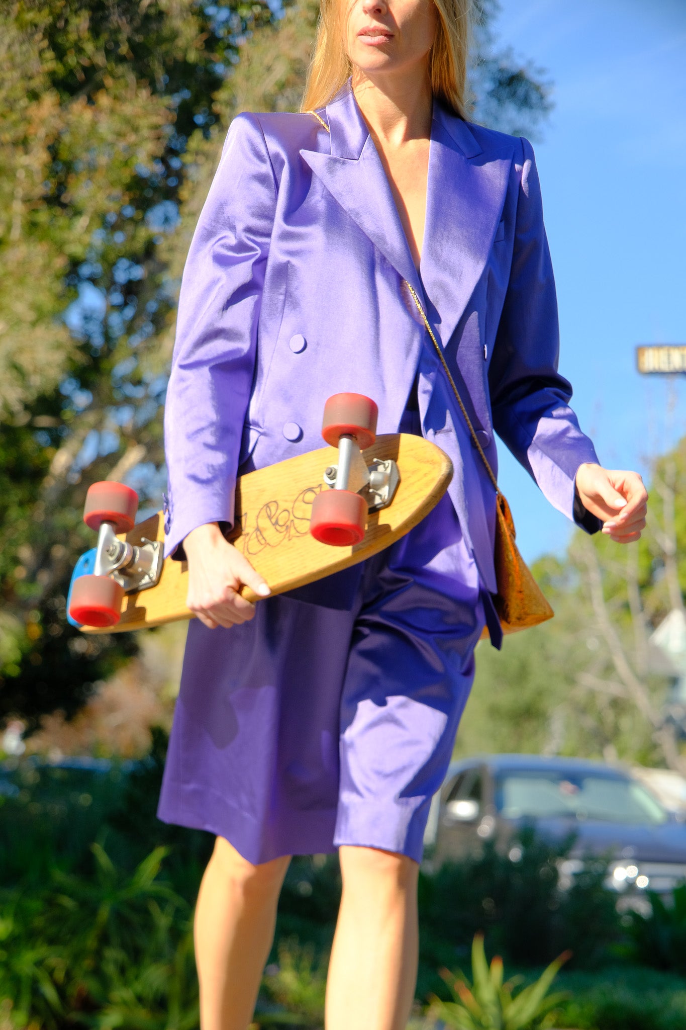 Lavender cotton-blend satin straight-leg Bermuda shorts from Dries Van Noten with a refined drape and tailored finish. Available in Brentwood, CA and Charlotte, NC.