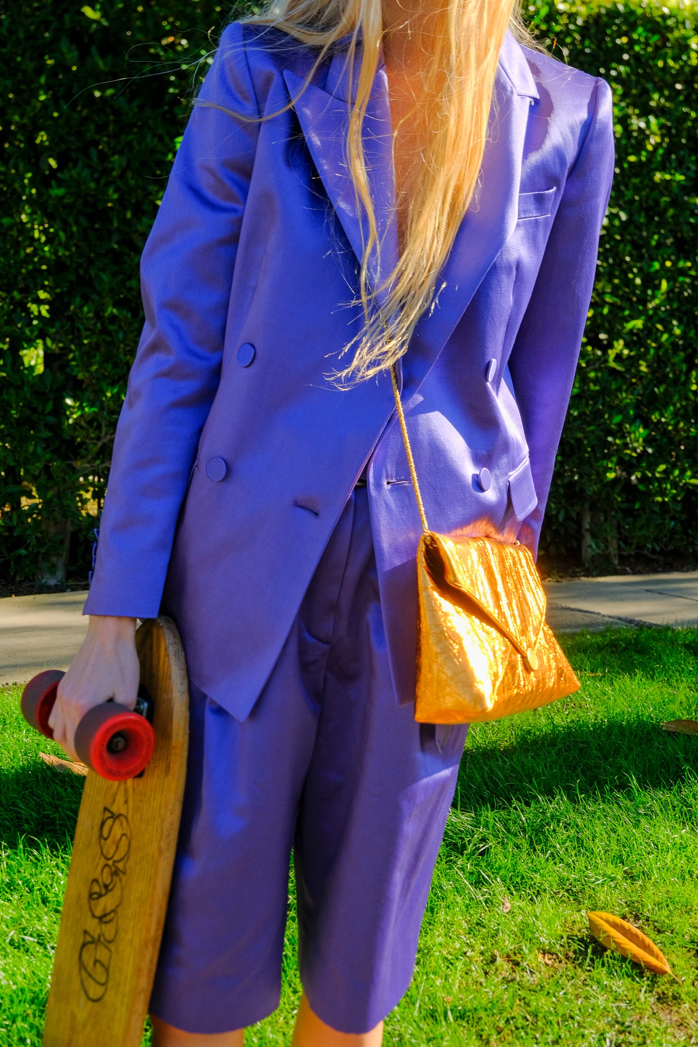 Lavender blazer from Dries Van Noten in a washed satin. The blazer is double breasted with sharp lapels and long sleeves. Available in Charlotte, NC and Brentwood, CA.