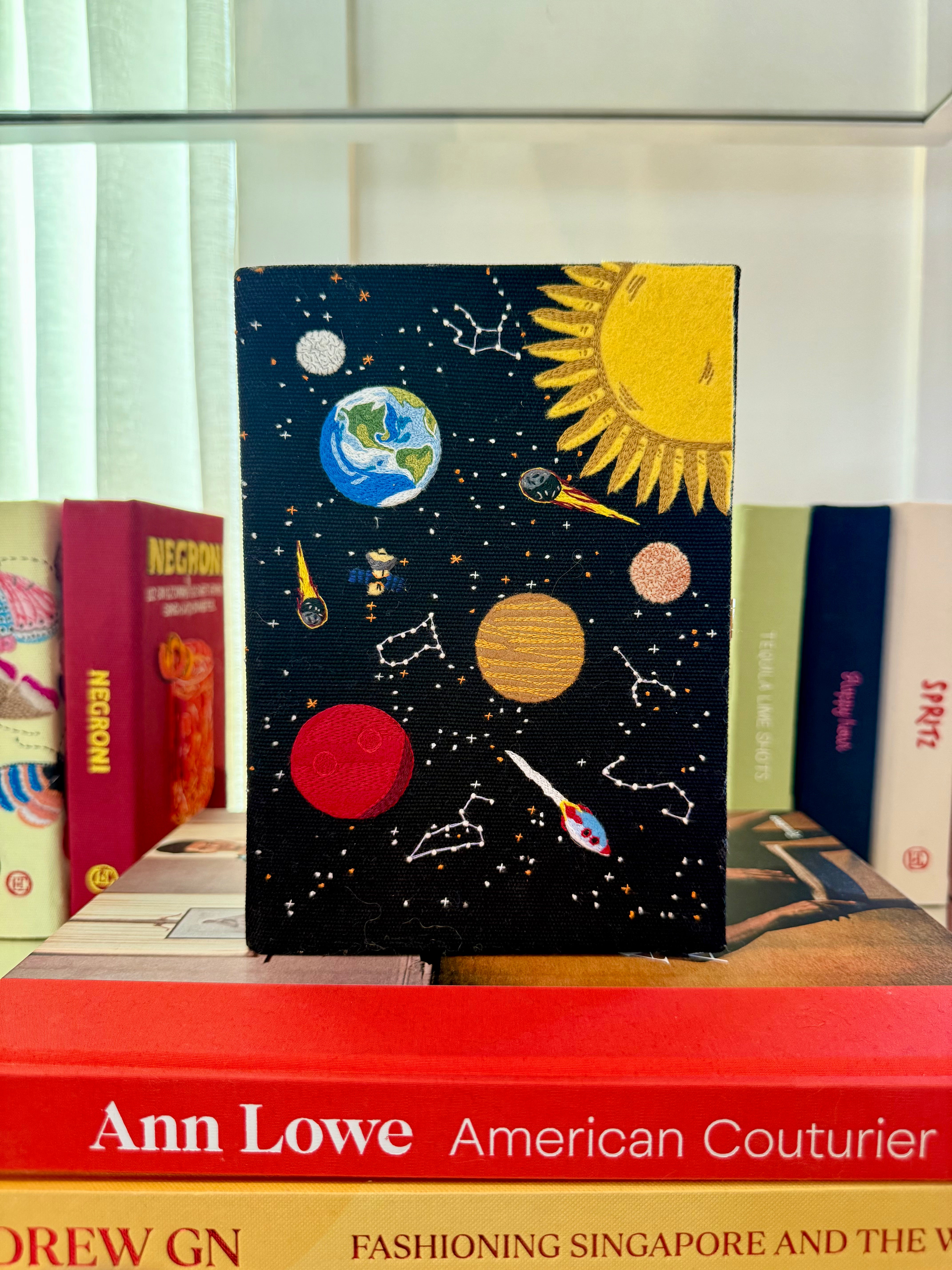 OLYMPIA LE TAN | PLANETS BOOK CLUTCH