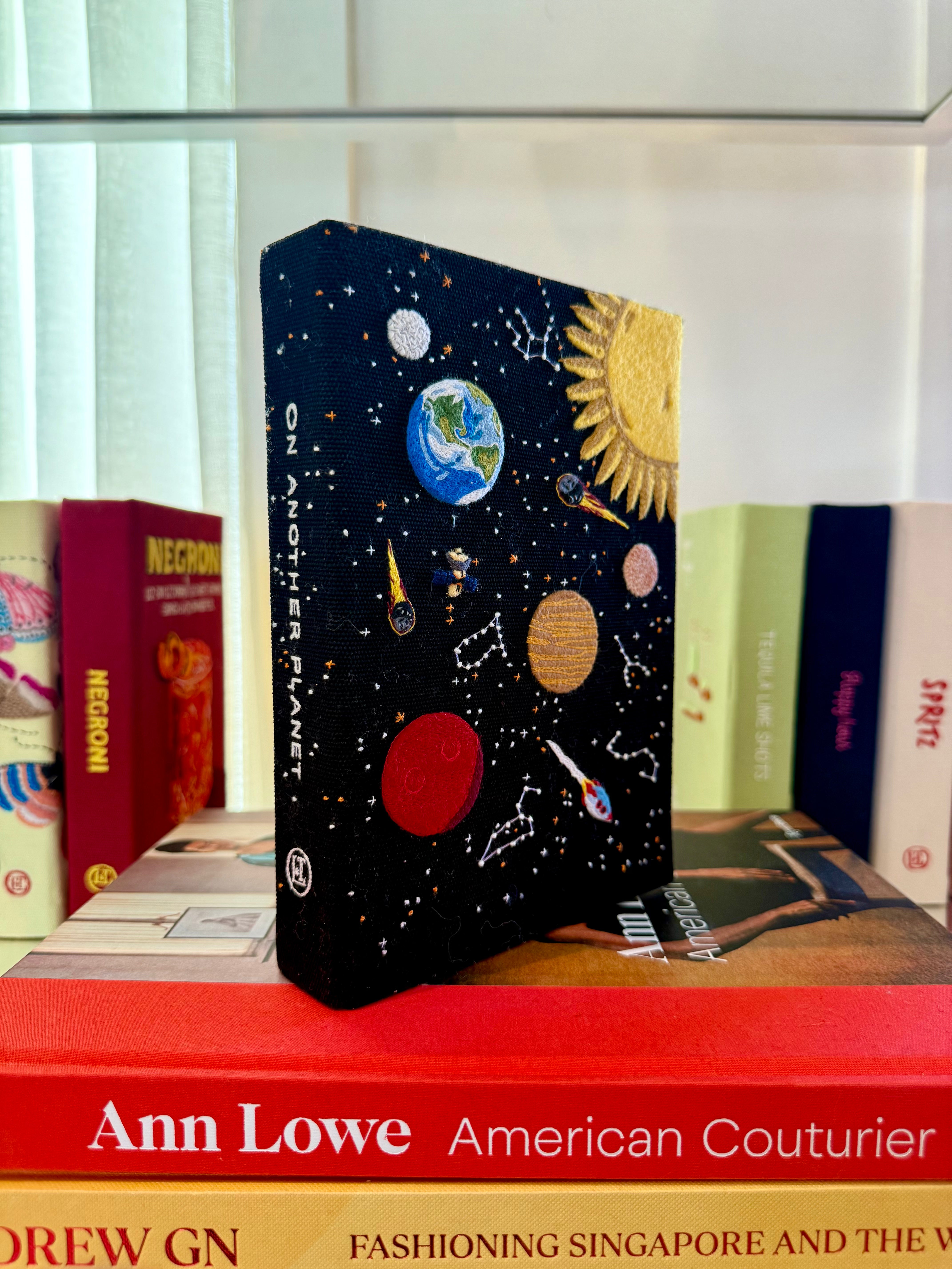 OLYMPIA LE TAN | PLANETS BOOK CLUTCH