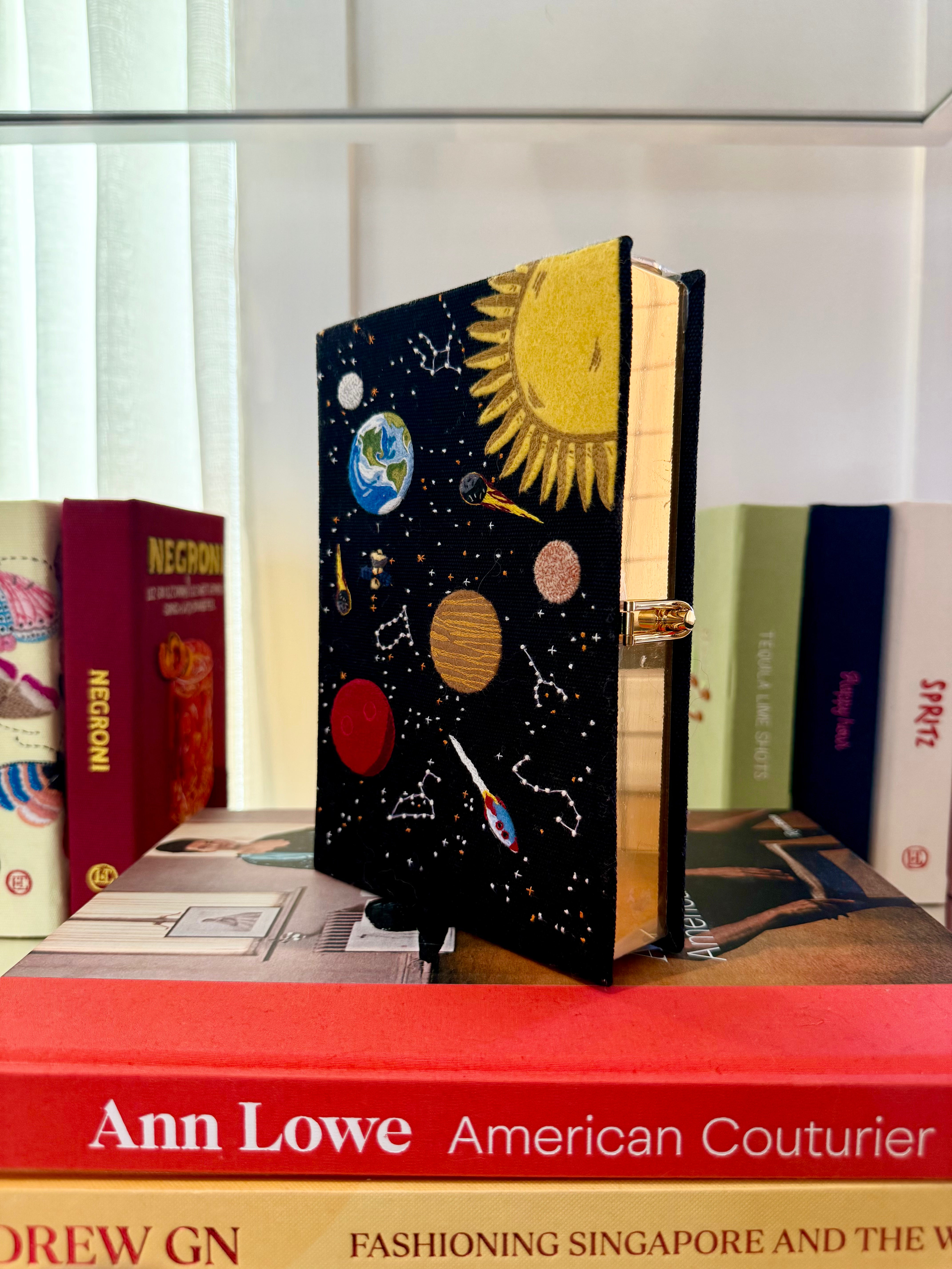 OLYMPIA LE TAN | PLANETS BOOK CLUTCH