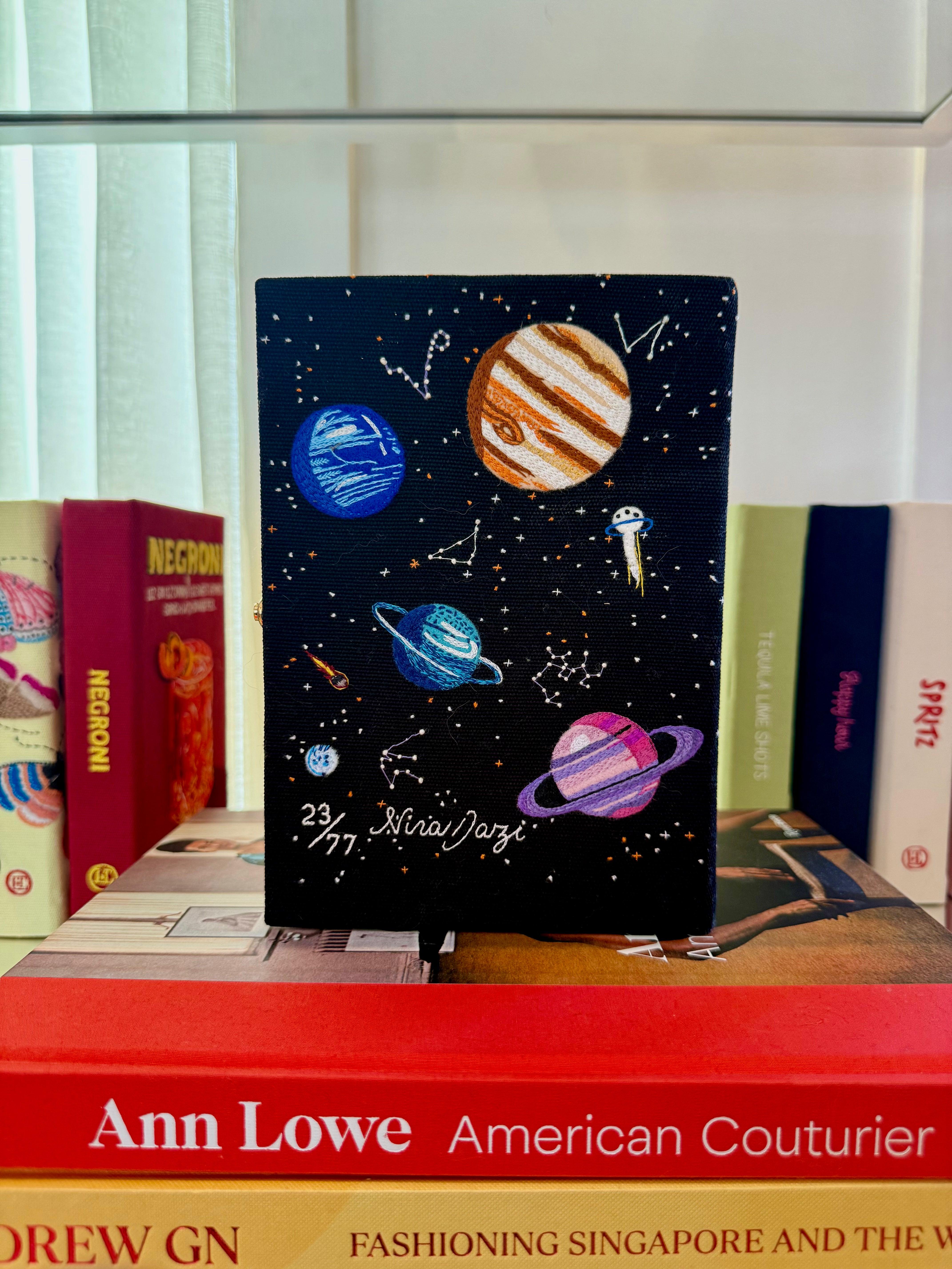 OLYMPIA LE TAN | PLANETS BOOK CLUTCH