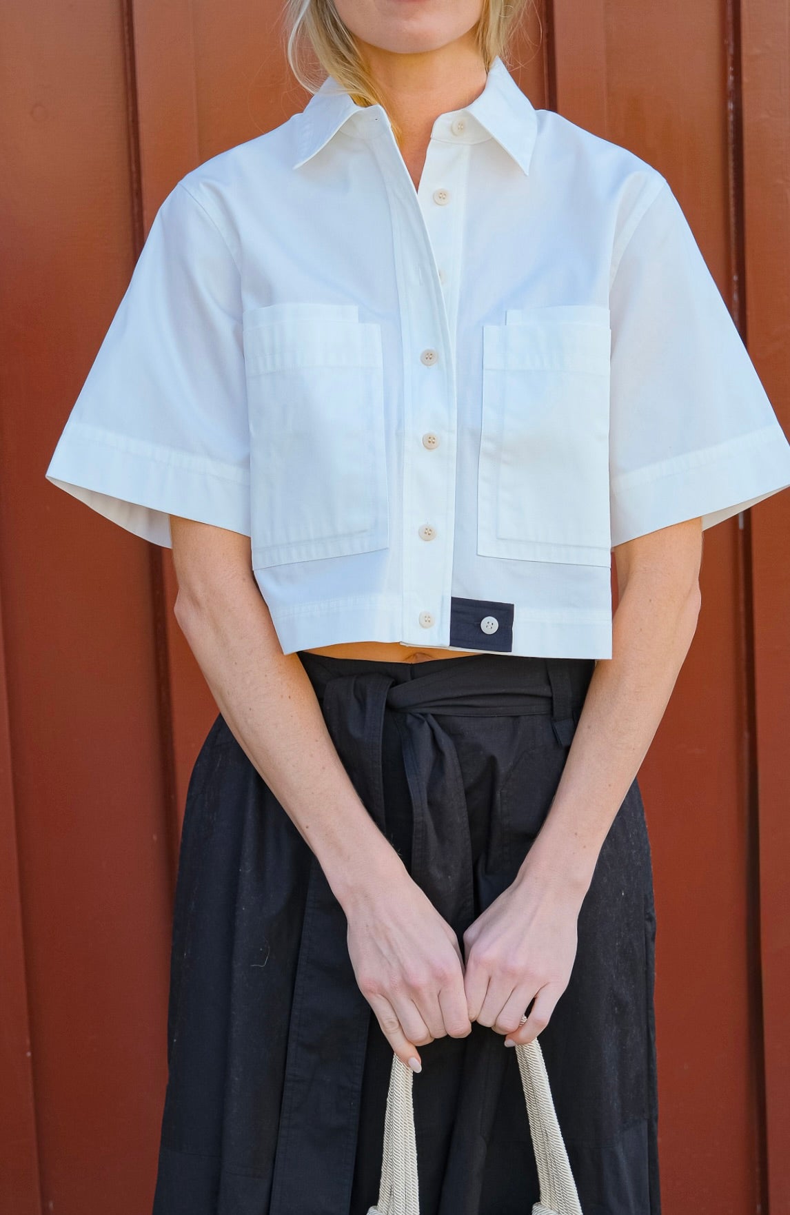 Lee Mathews boxy cropped white button down shirt. Available in Charlotte, NC and Brentwood, CA.