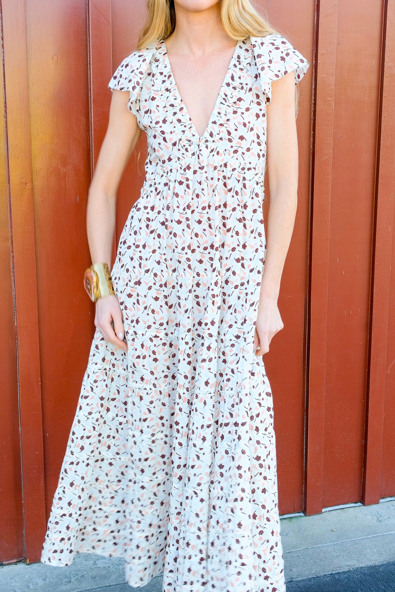 Lee Mathews printed holly midi dress with flutter sleeves. Available in Brentwood, CA and Charlotte, NC.