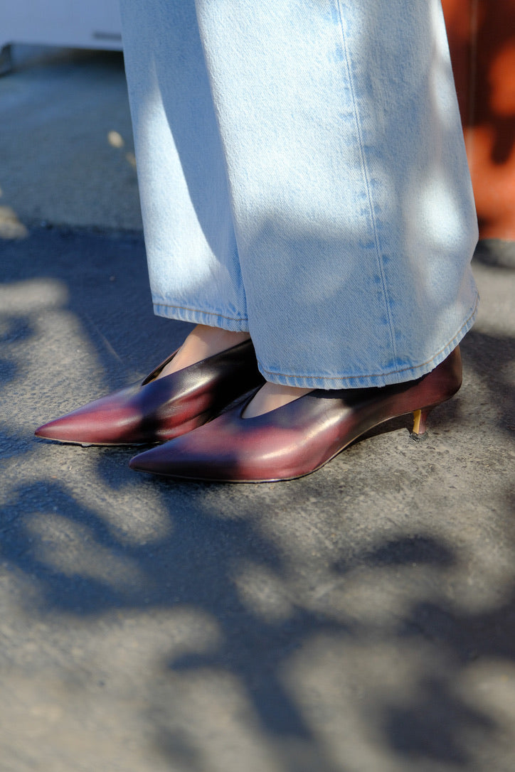 Aubergine leather kitten-heel pumps with a pointed toe and sleek profile from Blouse & Skirt. Available in Brentwood, CA and Charlotte, NC.