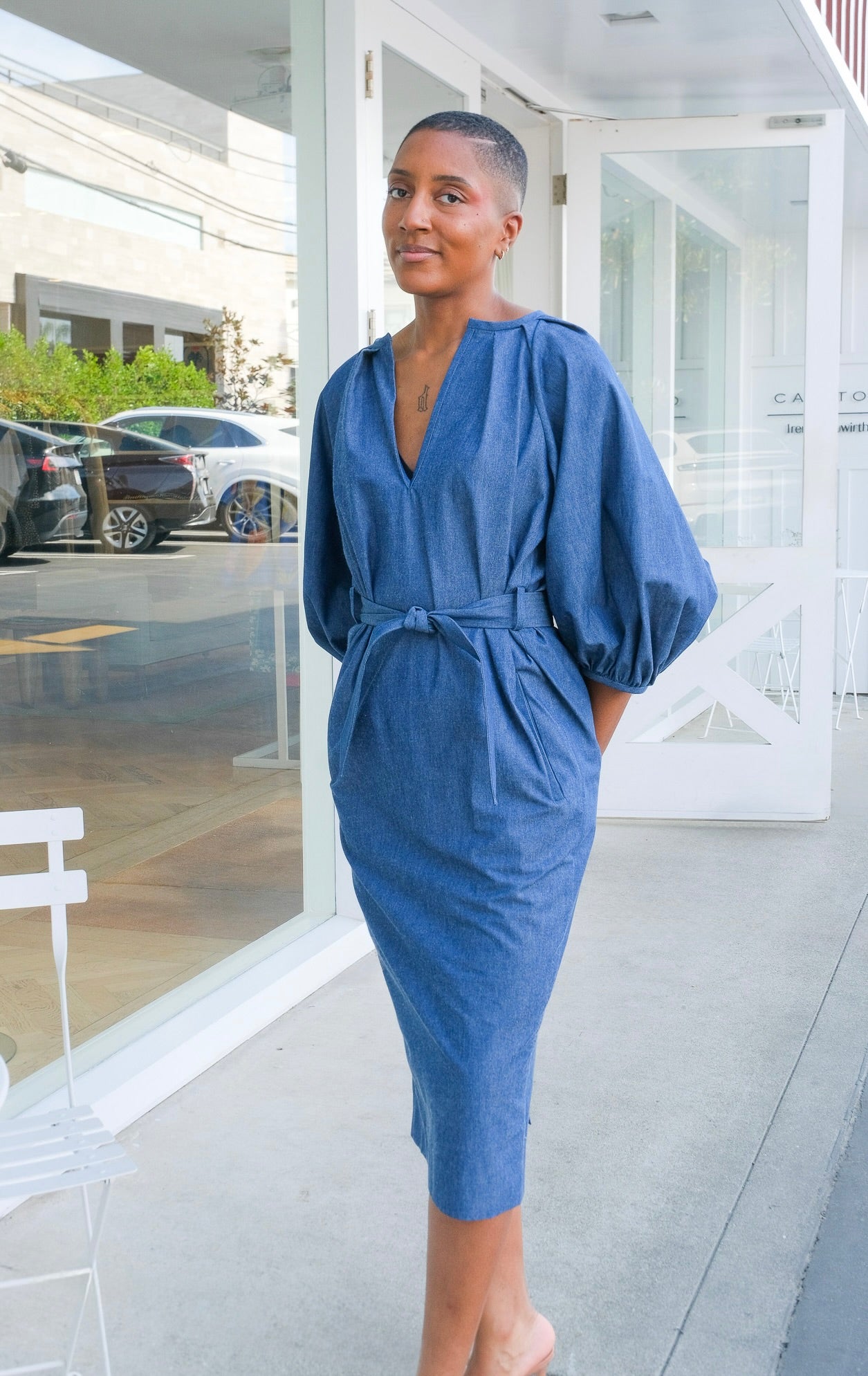 Blue linen balloon-sleeve midi dress from Martin Grant with a relaxed A-line silhouette. Available in Brentwood, CA and Charlotte, NC.