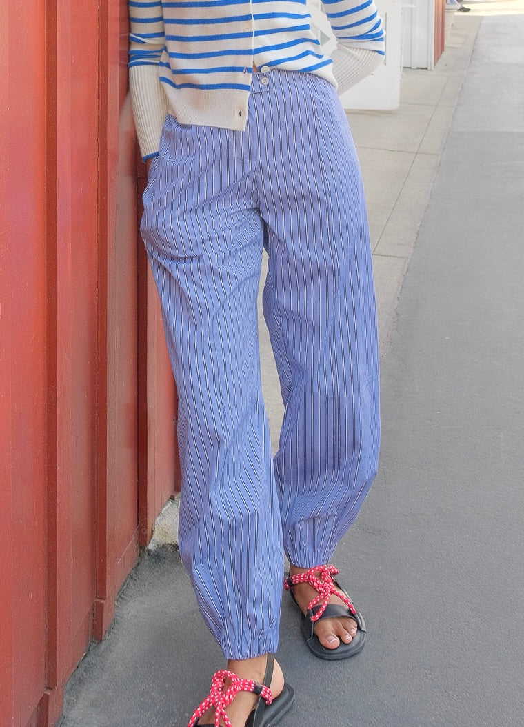 Nackiye blue and white striped Topaki pants with an elasticated waistband and hems. Available in Charlotte, NC and Brentwood, CA.
