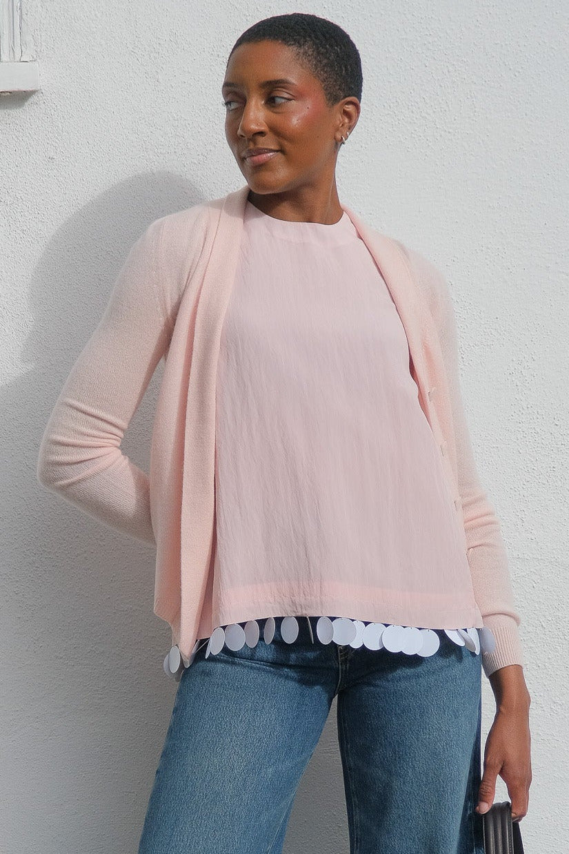 Baby pink button front cardigan from Plan C available in Brentwood, CA and Charlotte, NC.