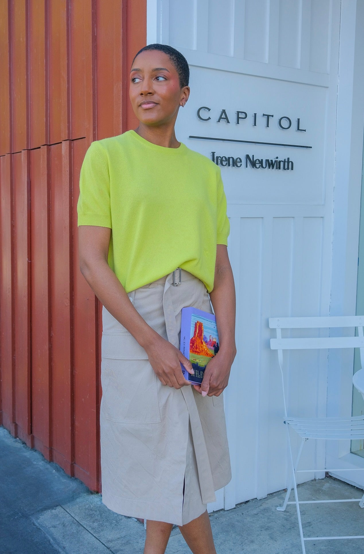 Sand colored utility wrap skirt from Plan C with a belted waist. Available in Charlotte, NC and Brentwood, CA.