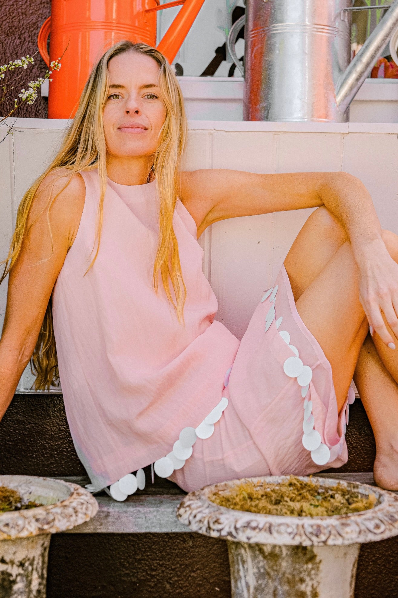 Pink viscose knee-length slip skirt from Plan C with oversized dot sequin embellishment and a straight silhouette. Available in Brentwood, CA and Charlotte, NC.