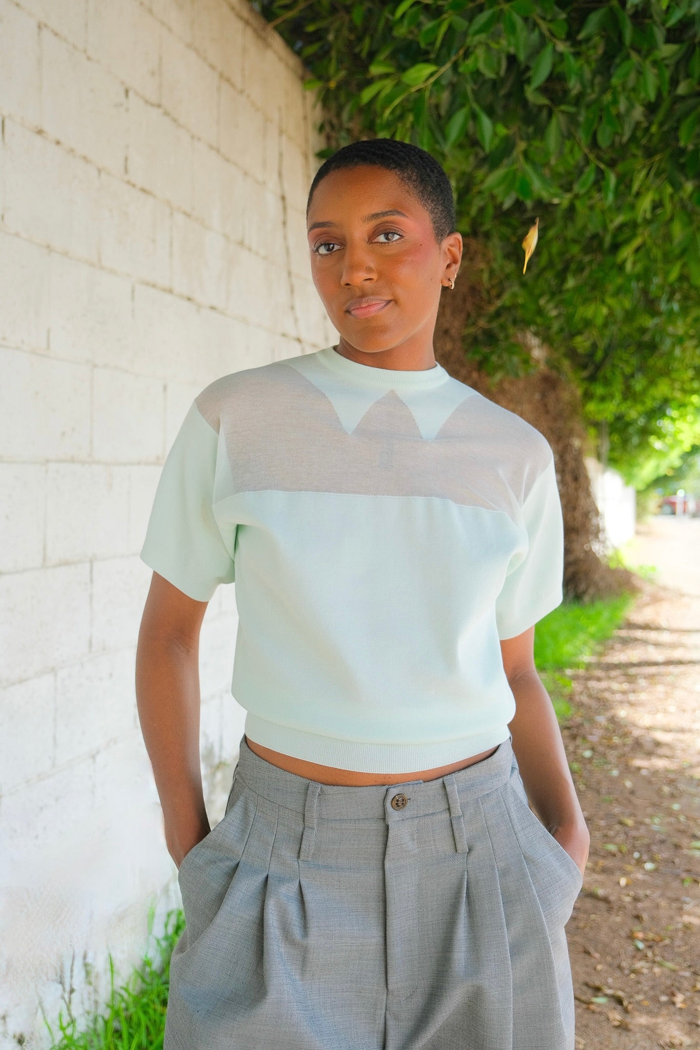The powder blue colored crewneck from Plan C with a sheer collar detailing. Available in Charlotte, NC and Brentwood, CA.