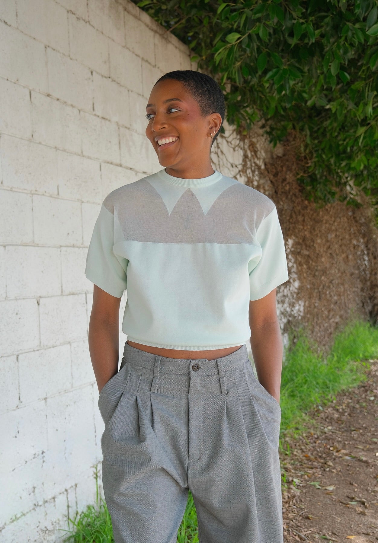 The powder blue colored crewneck from Plan C with a sheer collar detailing. Available in Charlotte, NC and Brentwood, CA.