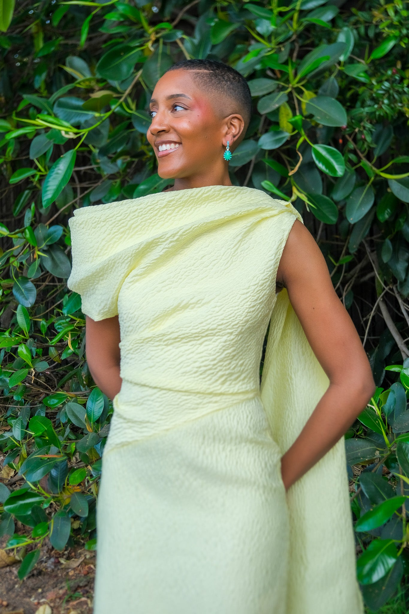 Limoncello yellow column midi dress from Roksanda with cape and asymmetrical neckline. Available in Brentwood, CA and Charlotte, NC.