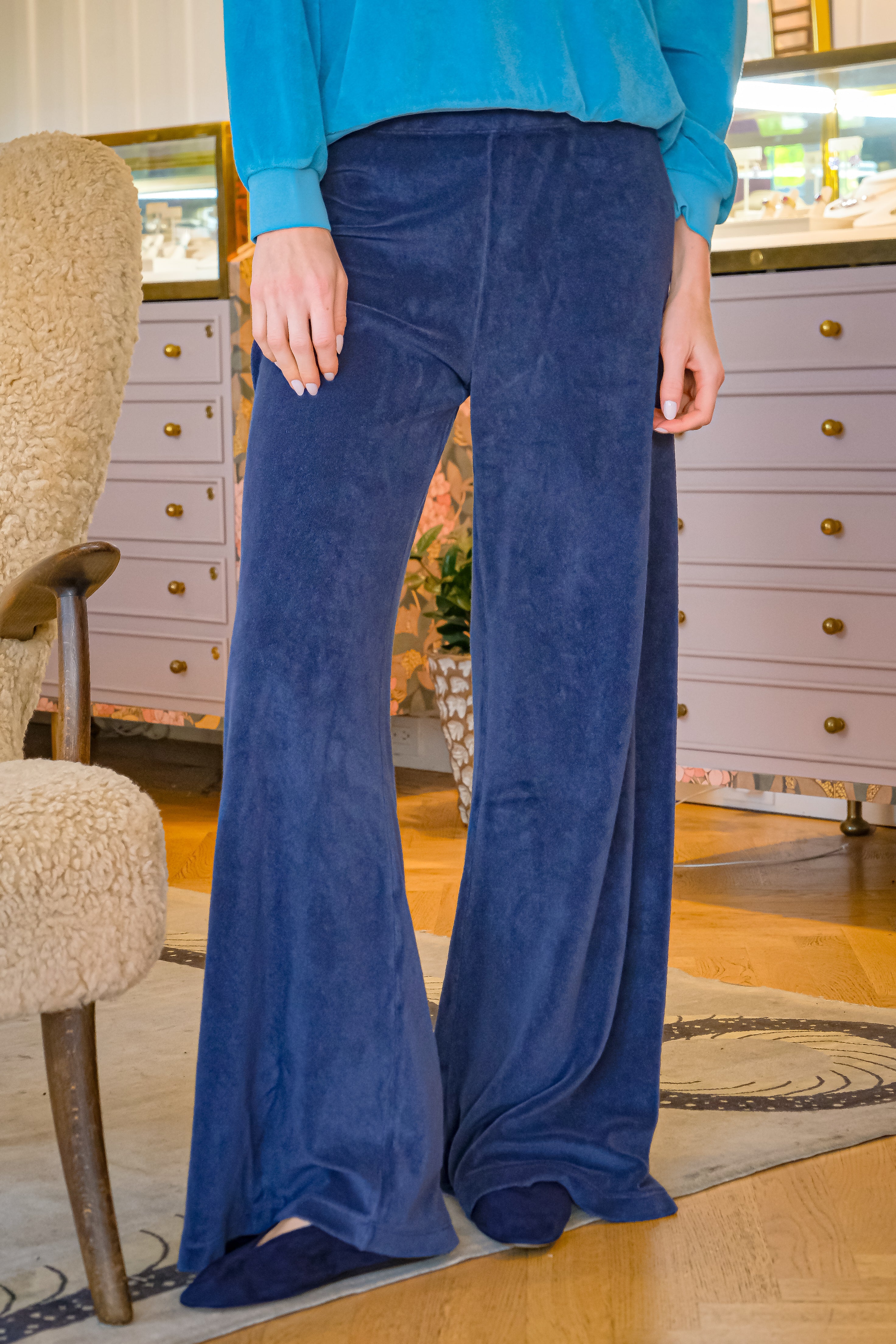 Navy cotton-blend terry flare pants from Suzie Kondi with a high-rise waist and wide flared leg. Available in Brentwood, CA and Charlotte, NC.