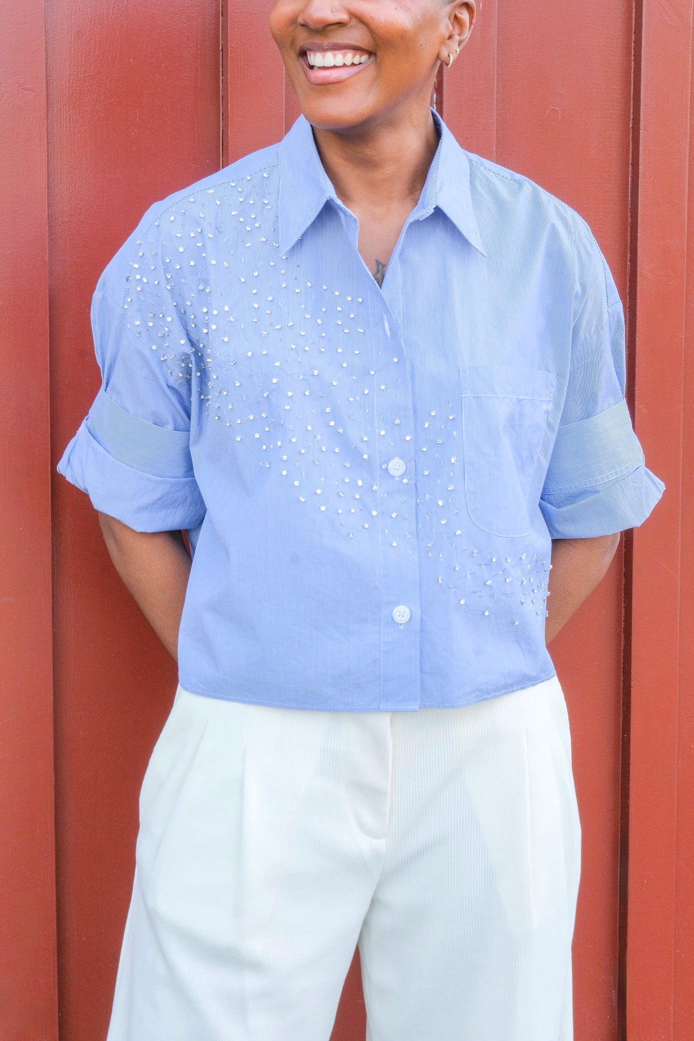 TWP Next Ex button down top with short sleeves and a collared neckline. Crystal embellishment detailing. Available in Brentwood, CA, and Charlotte, NC.