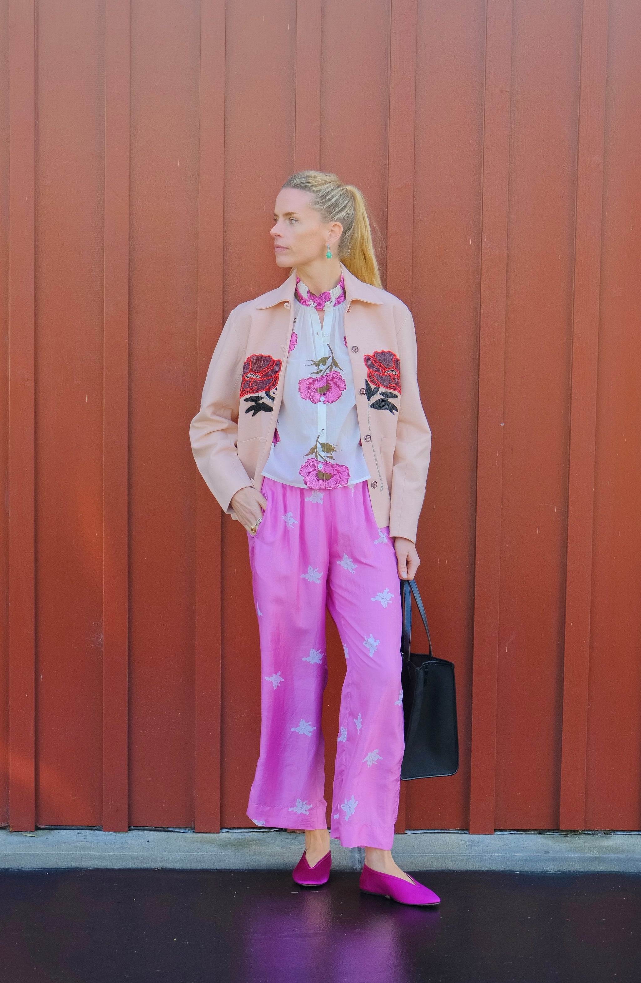 Pink floral silk cropped pants from Alix of Bohemia with a relaxed silhouette and elasticated waist. Available in Brentwood, CA and Charlotte, NC.
