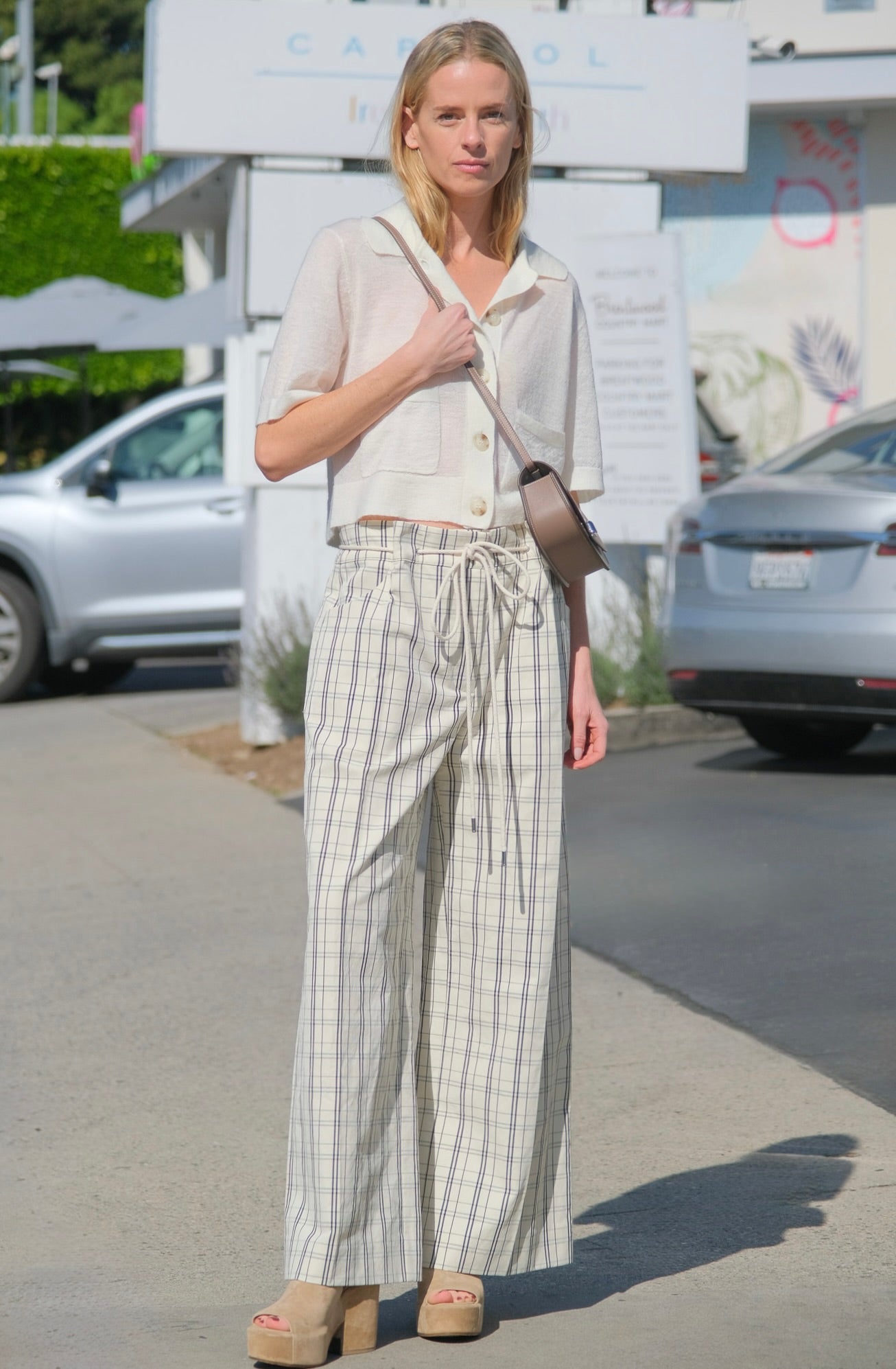 Lee Mathews plaid pants with front pleats and a high waist. Available in Charlotte, NC and Brentwood, CA.