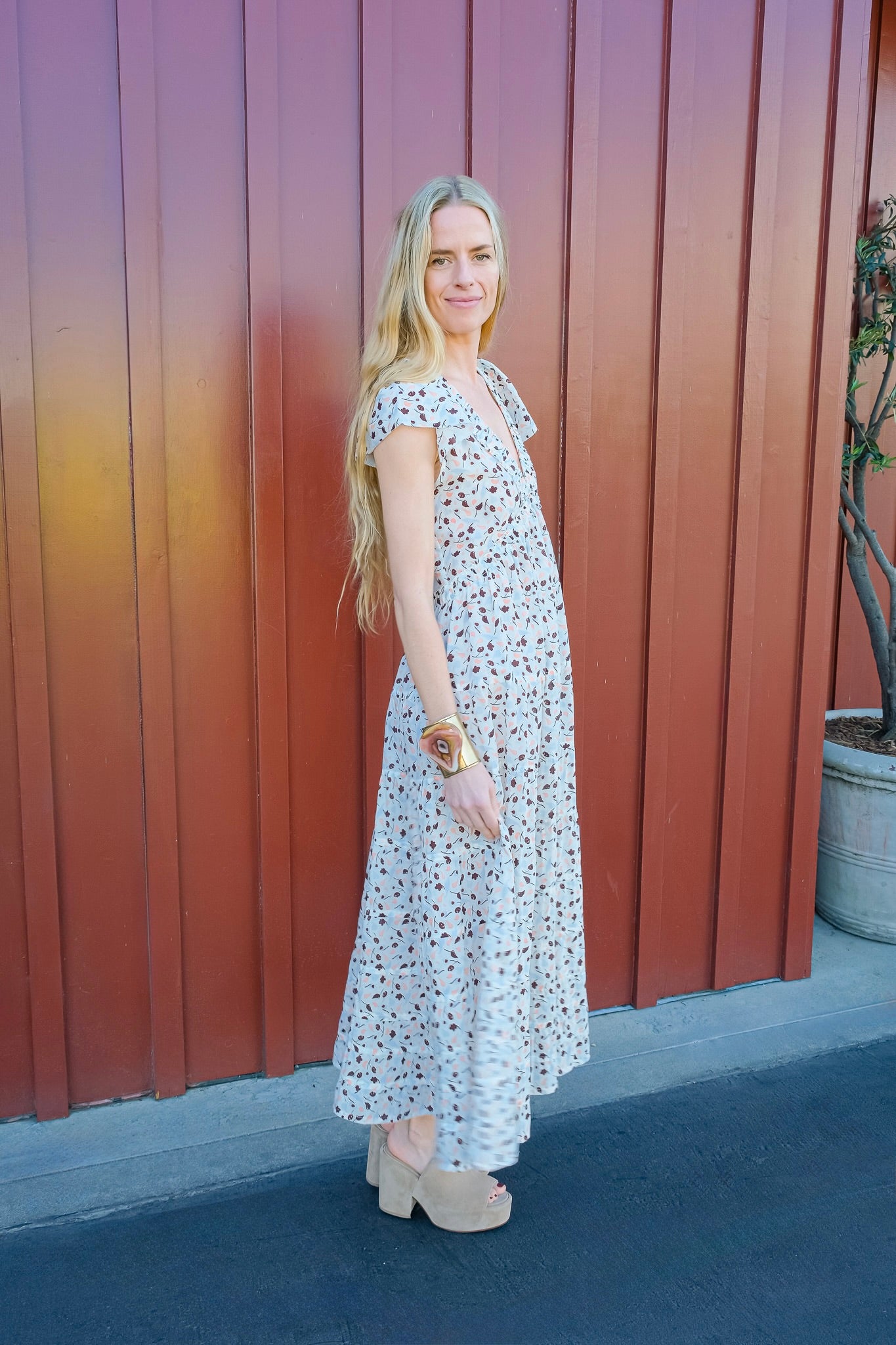 Lee Mathews printed holly midi dress with flutter sleeves. Available in Brentwood, CA and Charlotte, NC.