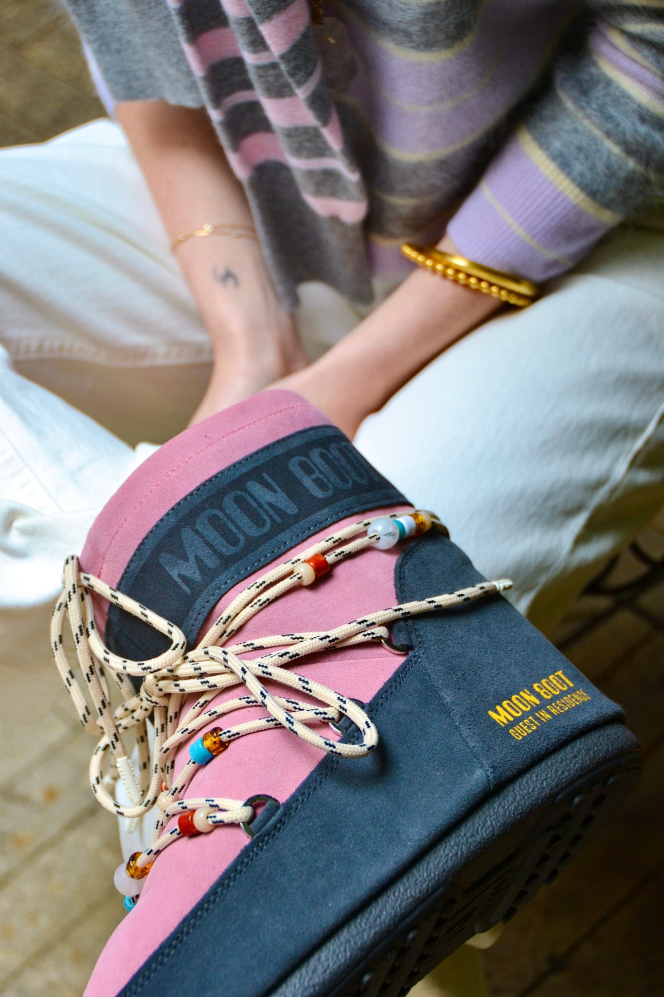 MOONBOOT ICON LOW SUEDE BEAD BOOTS | Moon Boot x Guest in Residence collaboration | Featured collaboration logo on heels | Color block suede in Rose and Grey | Contrast laces | Beaded detail | Yellow inside | Metal eyelets | Slip-on style | Composition: 100% Cowhide Upper, 92% Polyester 8% Polyurethane, rubber sole | Hand wash with cold water if needed | Made in Romania