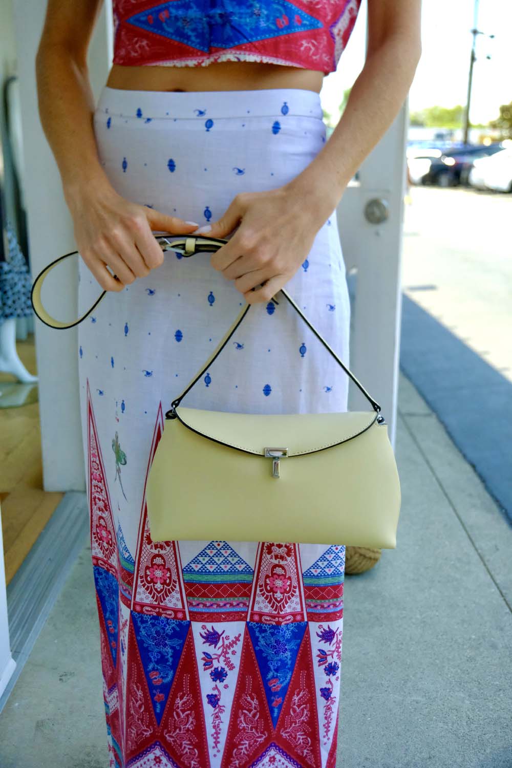 TOTEME | T-LOCK LEATHER CLUTCH CHAMPAGNE | WOMEN'S LUXURY DESIGNER CLOTHING, JEWELRY & ACCESSORIES | CAPITOL CHARLOTTE, NC & BRENTWOOD, CA