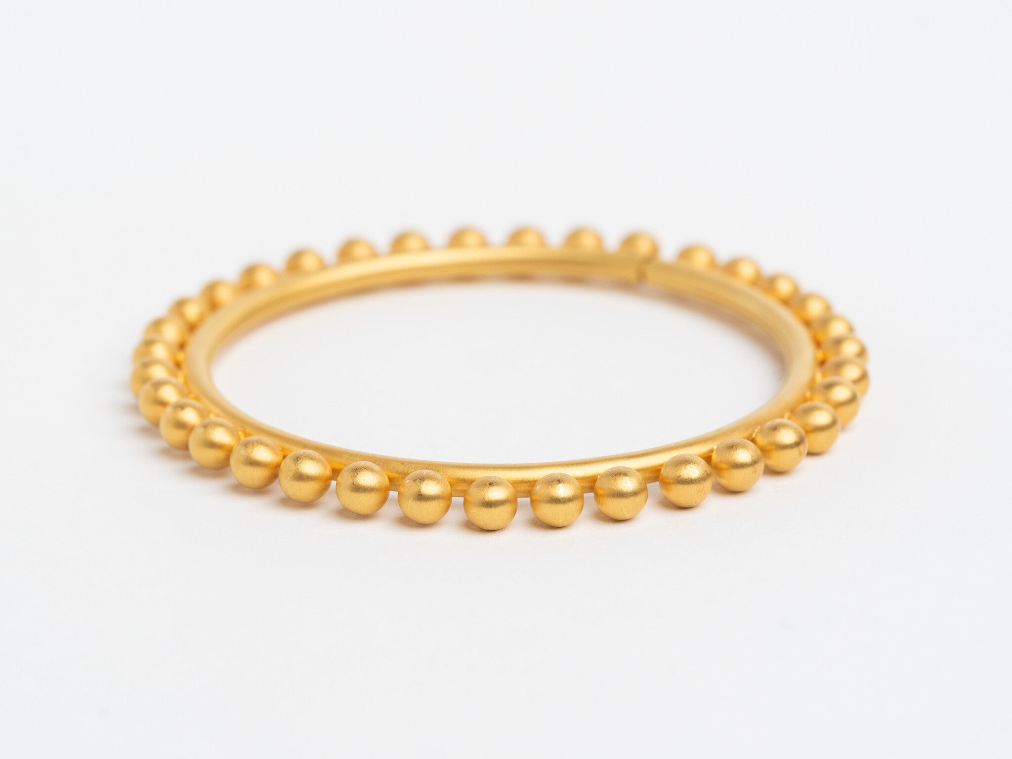 GOLD ROUND SPHERE BANGLE